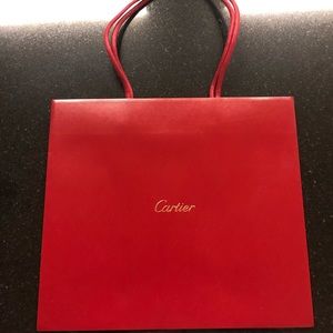 Cartier earrings shopping bag